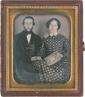 Lot 4030, Auction  121, Daguerreotypes, Portrait of a young couple with a photo album