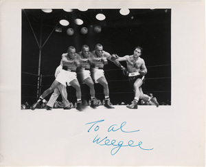 Lot 4262, Auction  128, Weegee, Jersey Joe Walcott and Rocky Marcianoboxing match (Distortion)