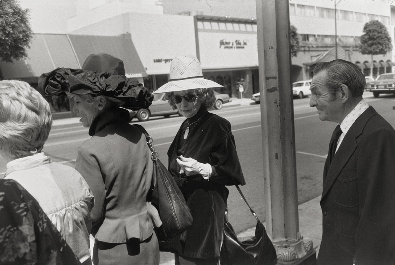 Lot 4266, Auction  128, Winogrand, Garry, Beverly Hills, California from the series 'Women are Better Than Men. Not Only Have They Survived, They Do Prevail'
